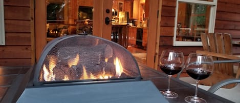 Enjoy a cozy fire on your private deck.