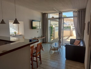 Living room with open kitchen