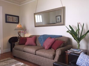 Relax on the couch to read a book on those days you decide to stay in.