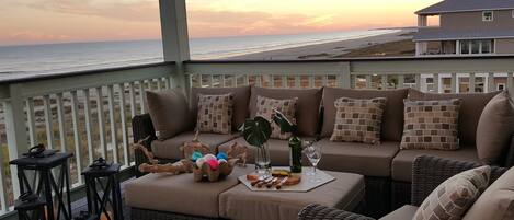 You and loved one with a glass of wine under the sunset.  Priceless!