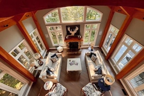 Our open concept cottage has natural light from the soaring windows. 18x20ft.