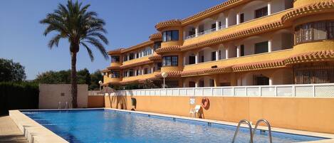 Pool and apartment (ground floor right) view