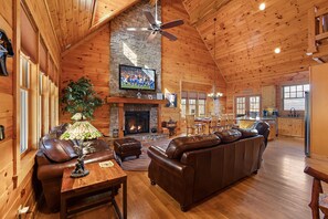 Cozy Living Room with gas log fireplace, TV