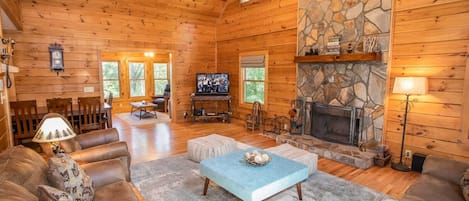Living Room with Vaulted Ceiling, Wood-Burning Stone Fireplace, Flat Screen TV