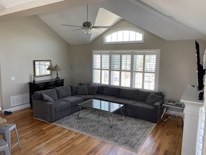 Large open concept with plantation shutters