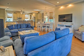 Inside the home, you'll find 2,000 square feet of coastal-inspired living space packed with amenities, such as an in-house elevator.