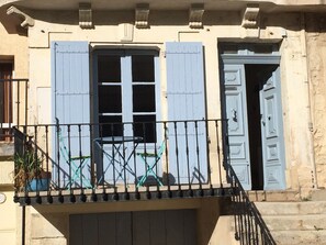 entrance, Small balcony overlooking the square.  large terrace at the back  