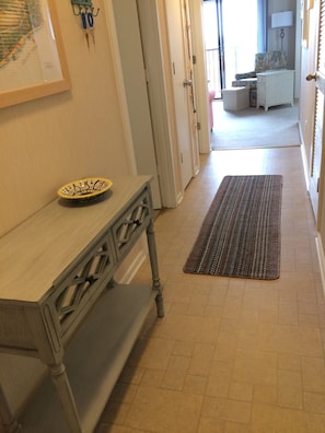 Entry hall to the living area and view of the beach.