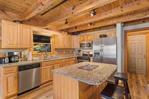 Kitchen with Granite Countertops and Stainless Appliances