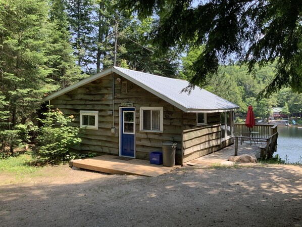 Front view and Parking area with new Deck and front Door 2023