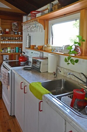 kitchen double sink and range