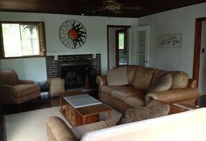 Spacious Living room with wood fireplace