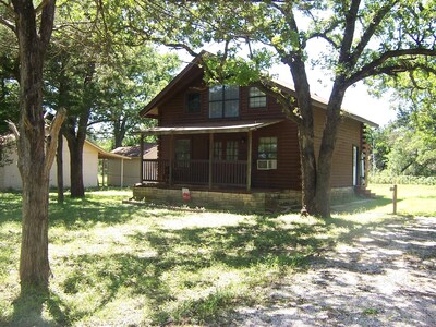 Two Story Log Cabin Located Approx 20 Miles From Austin & 15 Miles From Cota.