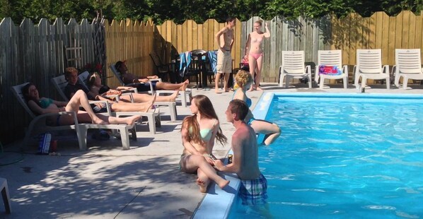 Beuatifull heated in ground pool with lounge chairs