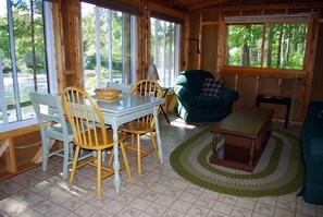 Dining and living area overlooking the Upper Conroy Rapids