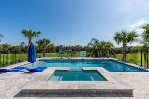Lounge by your private pool anytime