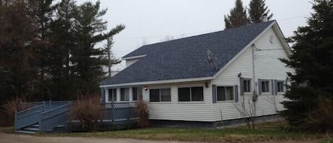 Looks like a house, but has a big cottage feel inside this large pine cottage