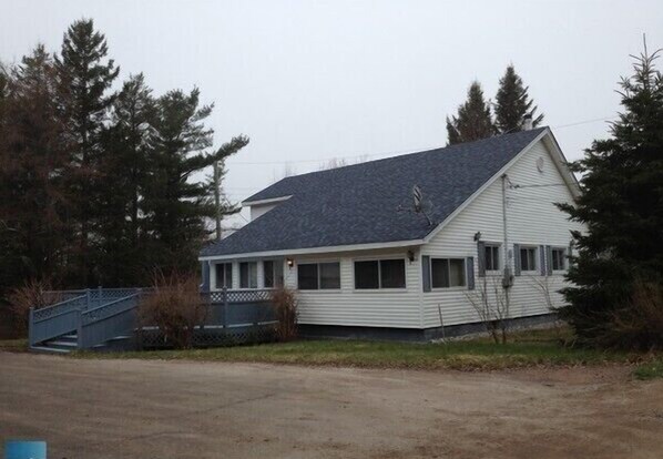 Looks like a house, but has a big cottage feel inside this large pine cottage