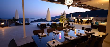 Amycha's beautiful terrace is just as amazing at Sunset for alfresco dining!