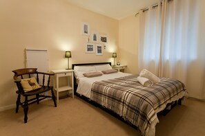 Bedroom: trouser press, double bed