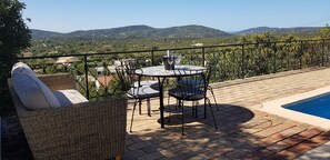 Stunning and relaxing panoramic views from the pool terrace overlooking gardens