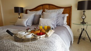 Luxurious Super-King Bedroom with En-suite leading directly to the upper terra