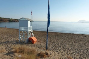 Sandy beach, that slopes lently. Perfecty safe for children!