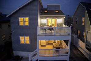 Front of the home with two very large decks