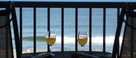 At the evening, enjoy a glass of wine on our balcony overlooking the ocean!