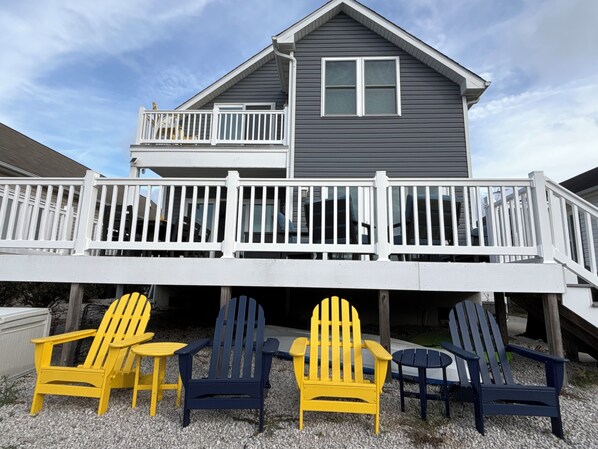 Two story home with perfect outdoor seating for the whole family