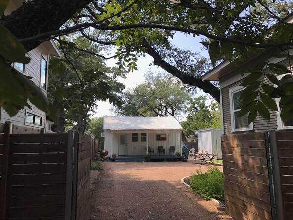 Private cottage within a gated and fenced enclosed yard.