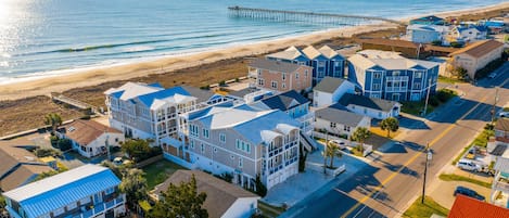 Beige house, street side, on the left. Beautiful views. 45 steps to beach.