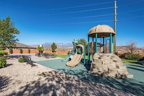 Community Playground and basketball court next door. This playground has few visitors, and is far enough away and angled from the house that our home still has plenty of privacy.