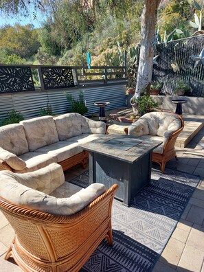 Cozy  seating area with fire pit table