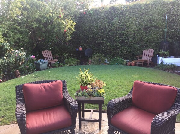 Peaceful and private fenced back yard, just outside the guest house.  