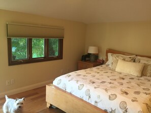  Comfortable CA King bed with plenty of windows.   Westie not included.
