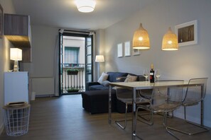  View of the living room from the kitchen. Very well equiped to thanks you for having chosen us.