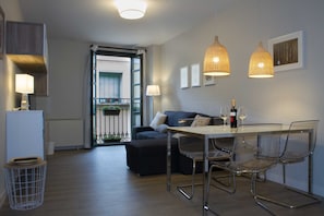 View of the living room from the kitchen. Very well equiped to thanks you for having chosen us.
