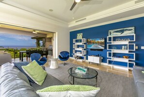 Living room with comfortable seating and flat screen TV