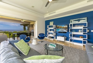 Living room with comfortable seating and flat screen TV