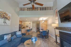 The guardrails on the second floor are connected to the kids' loft area.