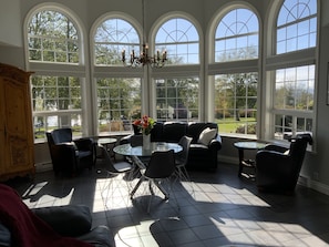 Beautiful Living area with Turret & wrap around window seating.