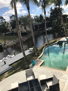 Waterfront Guest Suite with Pool, Mini Beach,  & Paddleboat