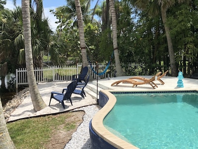 Waterfront Guest Suite with Pool, Mini Beach,  & Paddleboat
