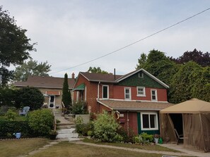 Cottage with main house behind