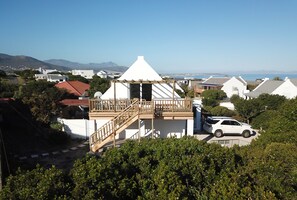 Side view of property and deck