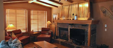 Great Room, Open Concept Living Room. Cozy Fireplace, vaulted wood ceilings.