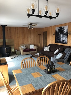 Cottage Living Room With View of the Lake
