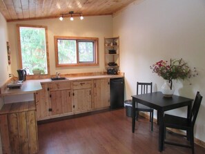 Kitchenet with dining table. 