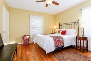 The front bedroom is ultra cozy with plush queen-size bed and luxe linens.